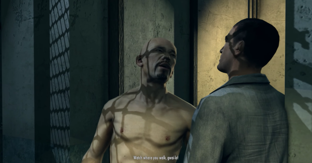 Два мужчины спорят в тюремной камере