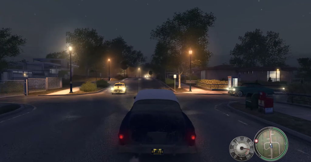 Автомобиль едет ночью по улице в Mafia II