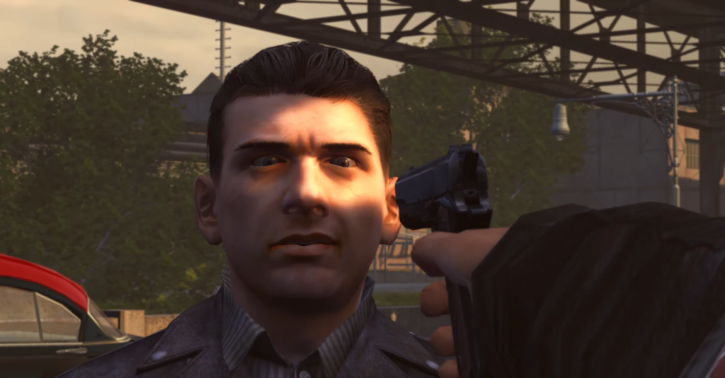 Пистолет у виска мужчины на улице под мостом