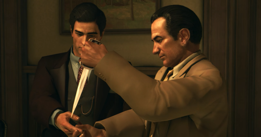 Вито Скалетта и Джо Барбаро держат нож в комнате