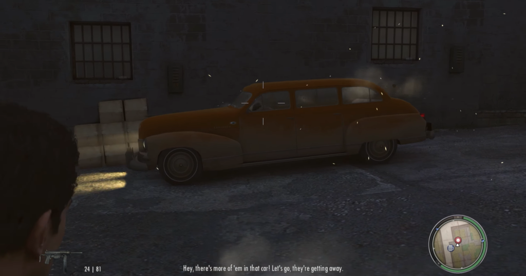 Автомобиль едет у здания в Mafia II