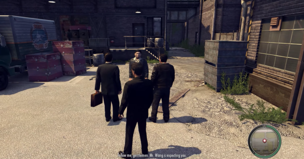 Персонажи Mafia II разговаривают во дворе склада