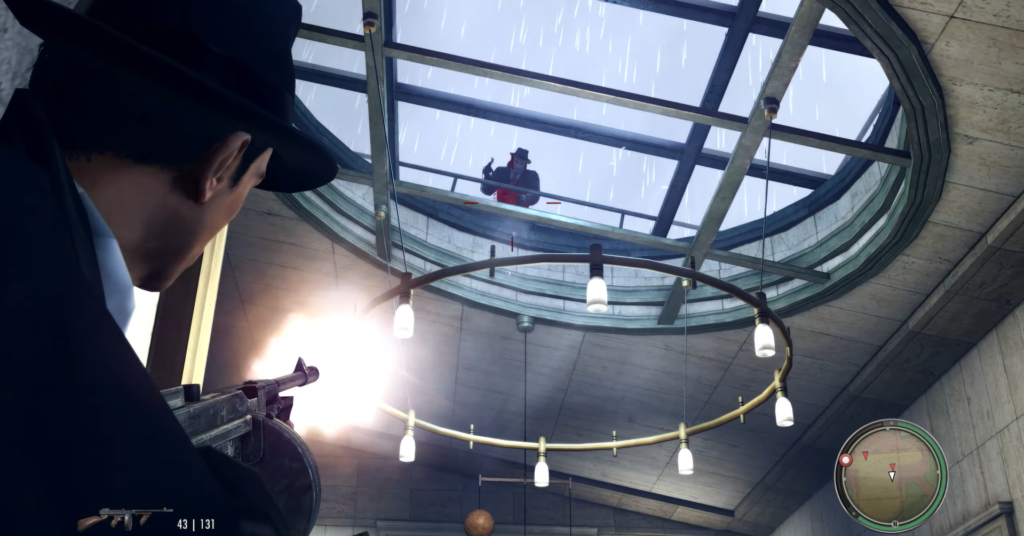 Персонаж Mafia стреляет из автомата в помещении под куполом