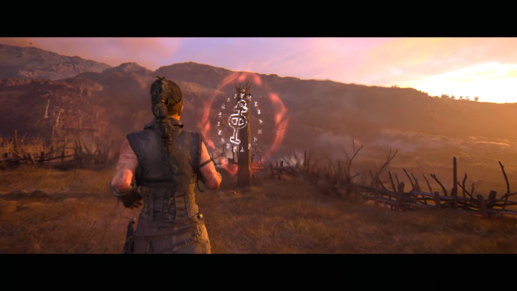 Профессор Фиг осматривает статую в руинах Hogwarts Legacy