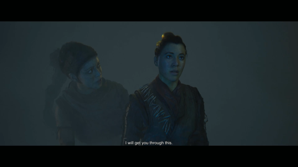 Тимоти Чайлог разговаривает с учеником у каменной стены