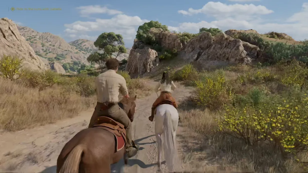 Два всадника едут по тропе среди скал