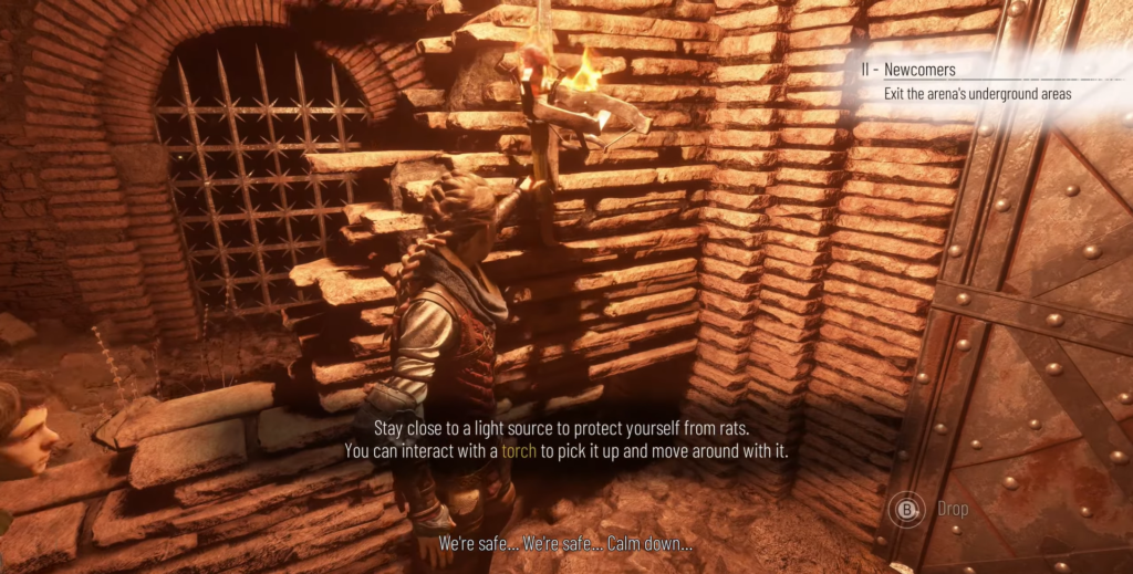 Амиция держит факел в подземелье A Plague Tale