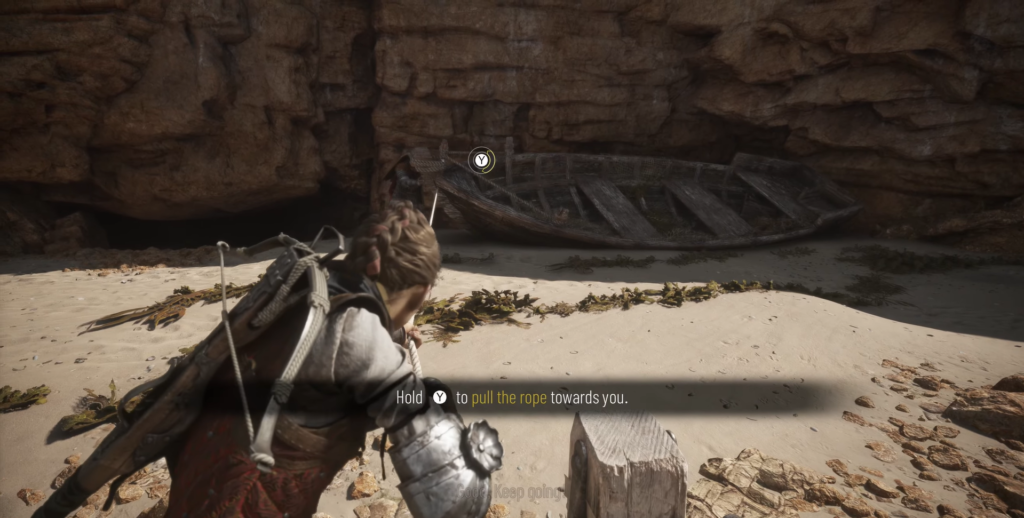 Амиция де Рун тянет верёвку на пляже