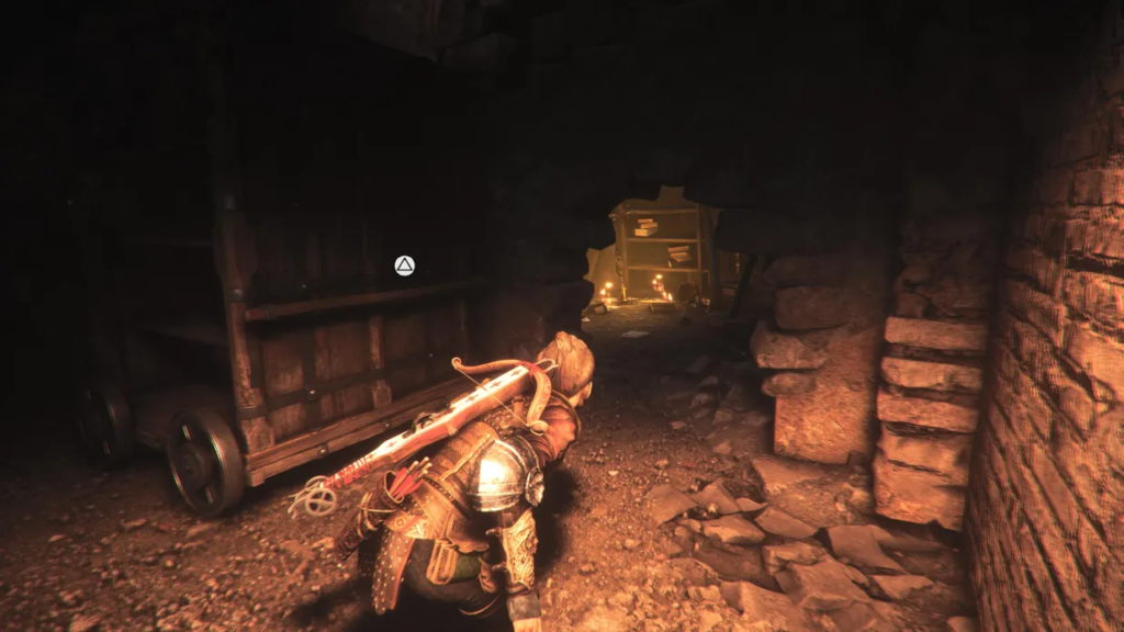 Амиция из A Plague Tale крадется в пещере