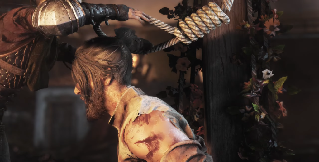 Мужчину вешают на верёвке у деревянного столба