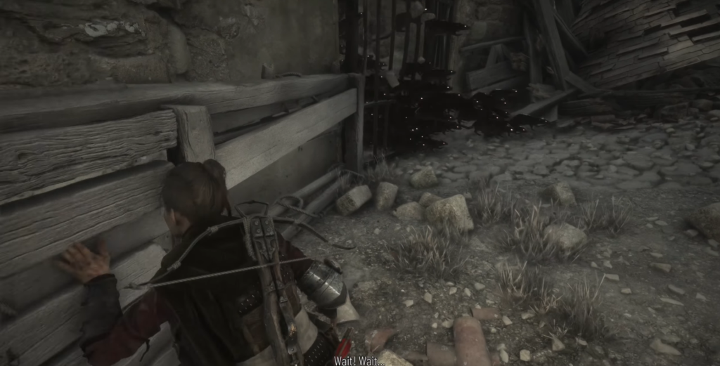 Амиция де Рун прячется у стены в A Plague Tale